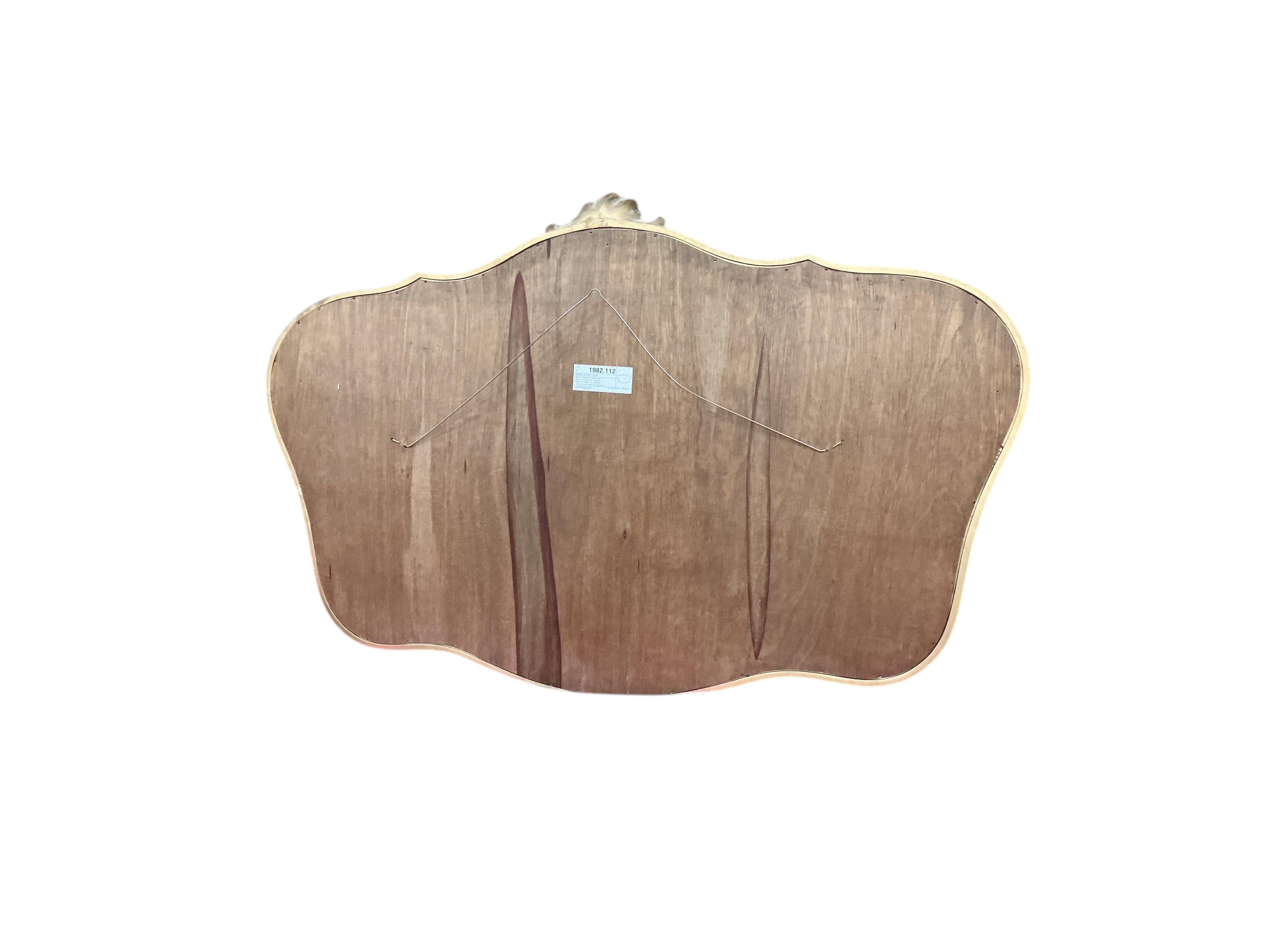 A reproduction Victorian style gilt composition wall mirror, width 120cm, height 80cm